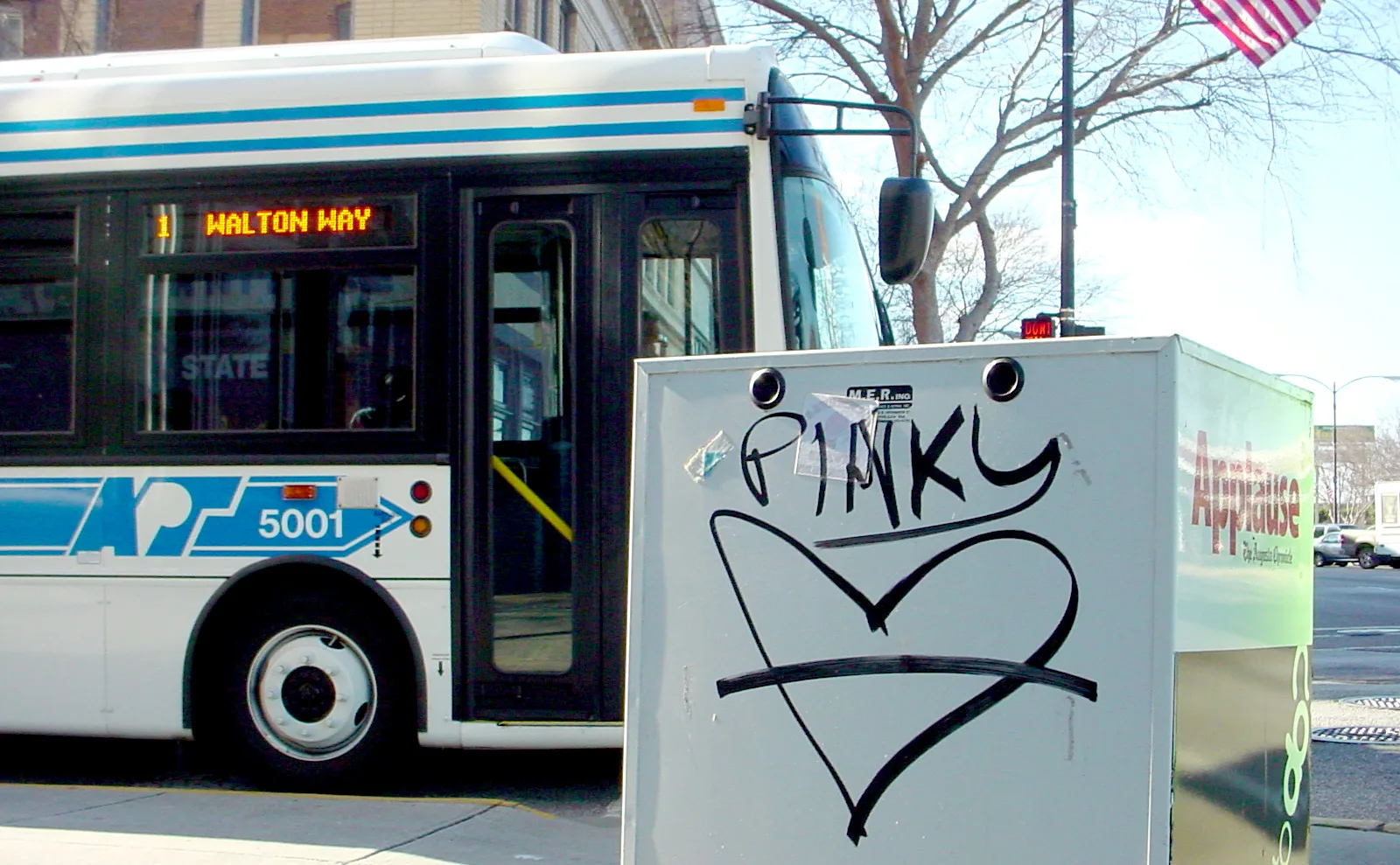 An Augusta Transit bus on a city street.