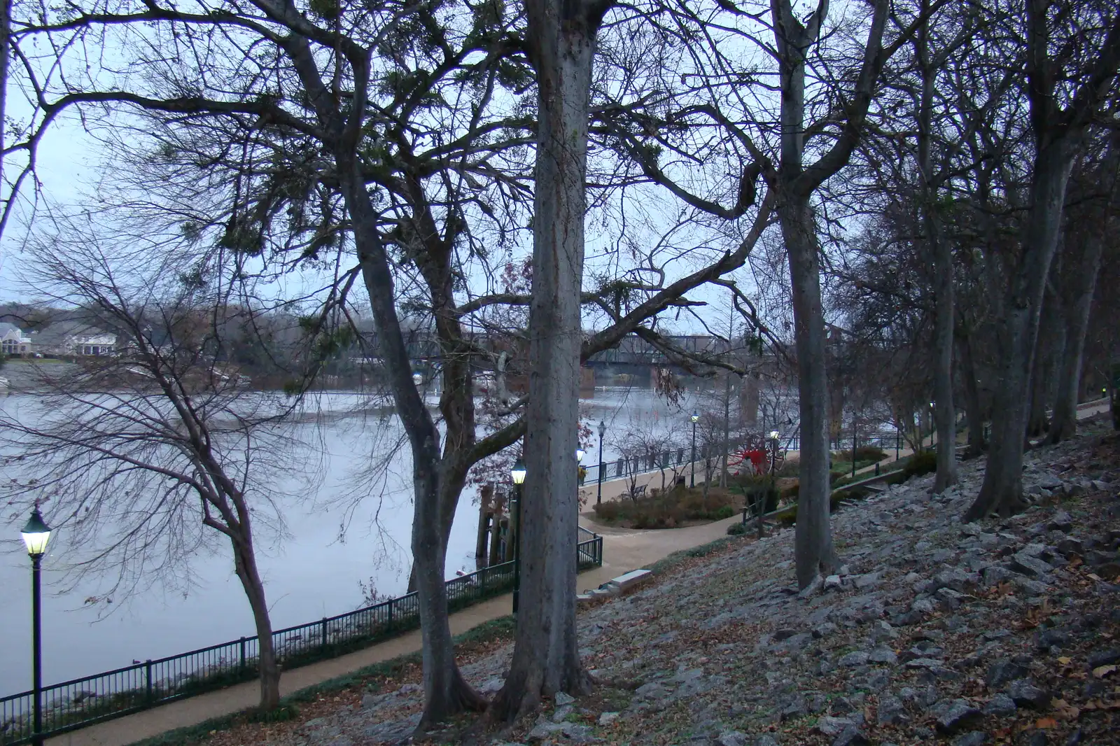 Lamps along the Augusta Riverwalk on the Savannah River on a winter evening.